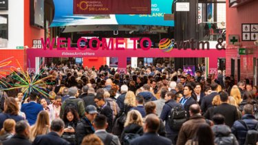 The entrance to World Travel Market full of travel professionals