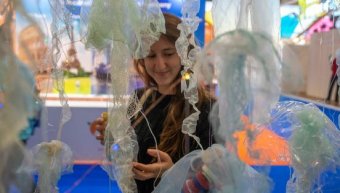 a happy lady visiting WTM London event