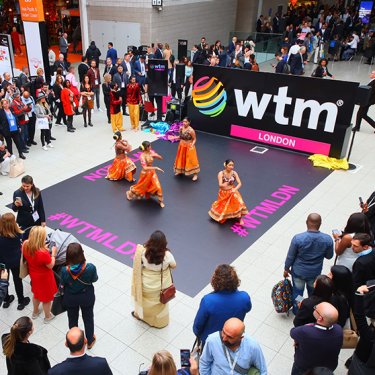 Dancers at the entrance to WTM London